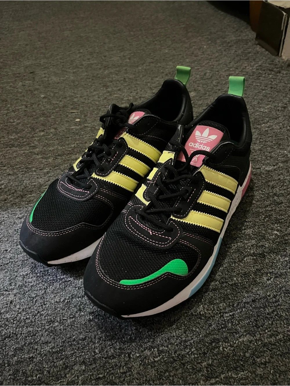 adidas Black Sneakers with Yellow Stripes and Green Accents